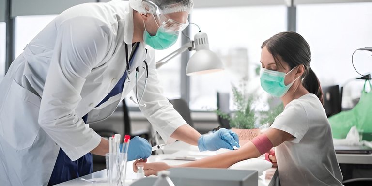 Healthcare professional drawing a patient's blood
